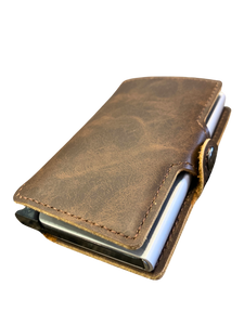 brown leather eazicard wallet featuring a metal casing with RIFD protection.