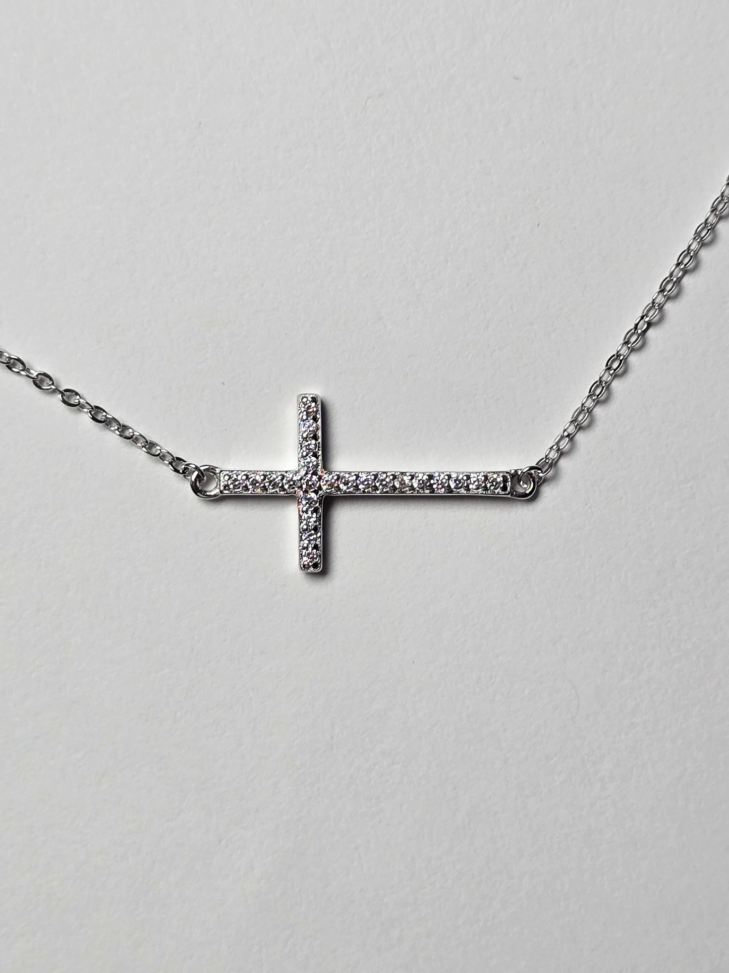 SIDEWAYS CROSS NECKLACE
