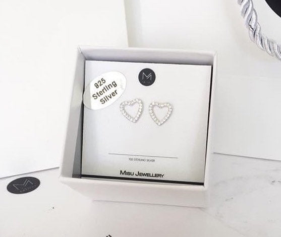  cubic zirconia heart outline sterling silver stud earrings displayed in gift box