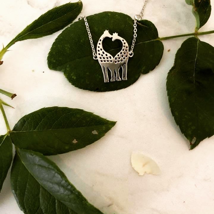 Sterling silver giraffe necklace.