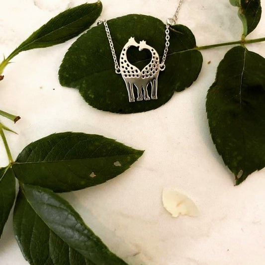 Sterling silver giraffe necklace.