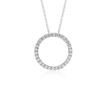 Sterling silver necklace with hollow circle pendant encrusted with diamante studs.