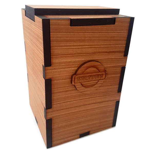 a wooden biltong box made from laser cut jigsaw pieces with a wooden label on front that says biltong