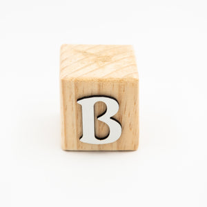 Wooden alphabet letter block B.