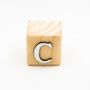Wooden alphabet letter block C.