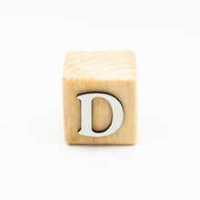Wooden alphabet letter block D.