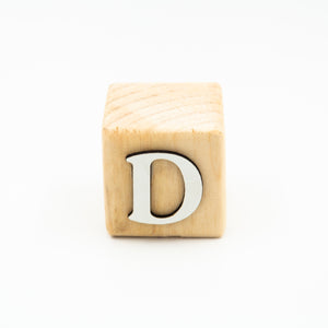 Wooden alphabet letter block D.