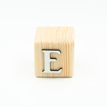 Wooden alphabet letter block E.