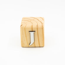 Wooden alphabet letter block J.