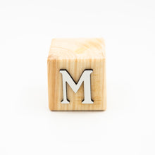 Wooden alphabet letter block M.