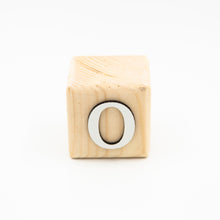 Wooden alphabet letter block O.